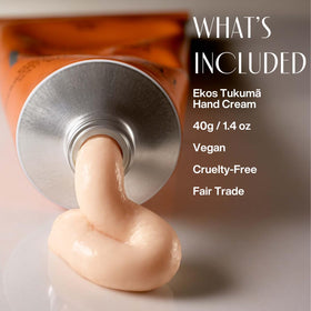 Close-up of Natura Tukumã Hand Cream texture on hand