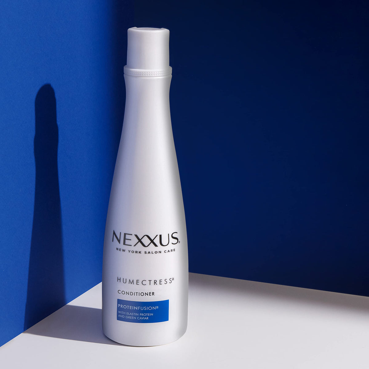Close-up of Nexxus Shampoo formula with green caviar