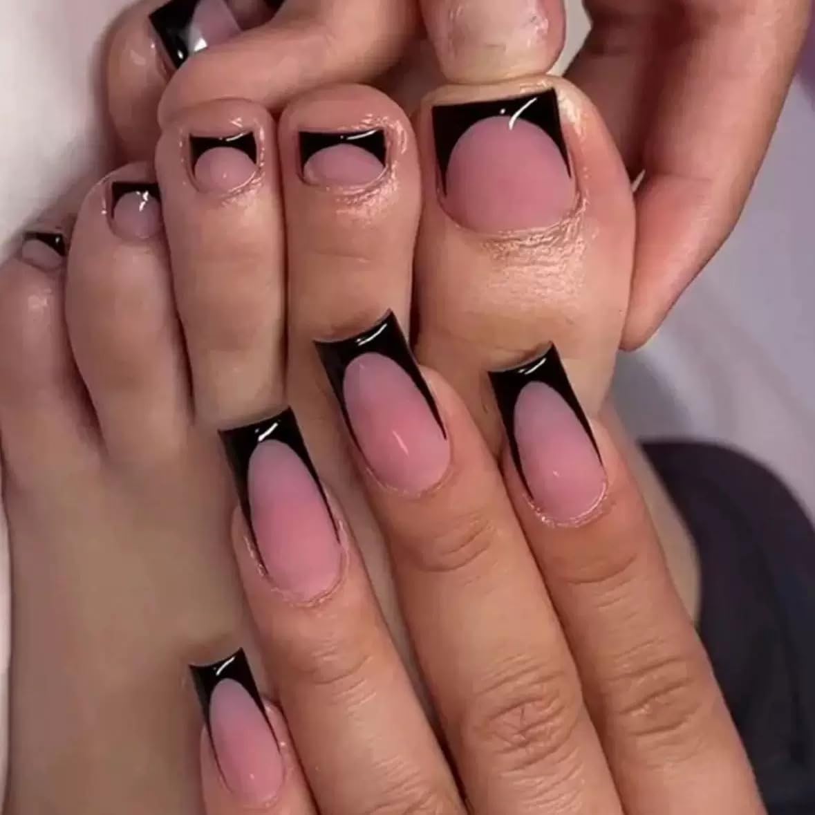 Close-up of NHIXK press on nails showing black French tips