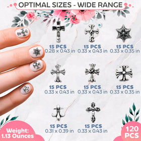 Close-up of Novsix silver cross nail charms on a nail design