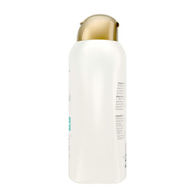 Close-up of OGX Coconut Curls Shampoo pump
