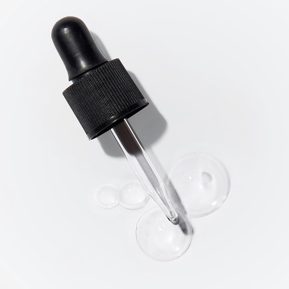 Close-up of OPI Drip Dry Drops bottle with dropper