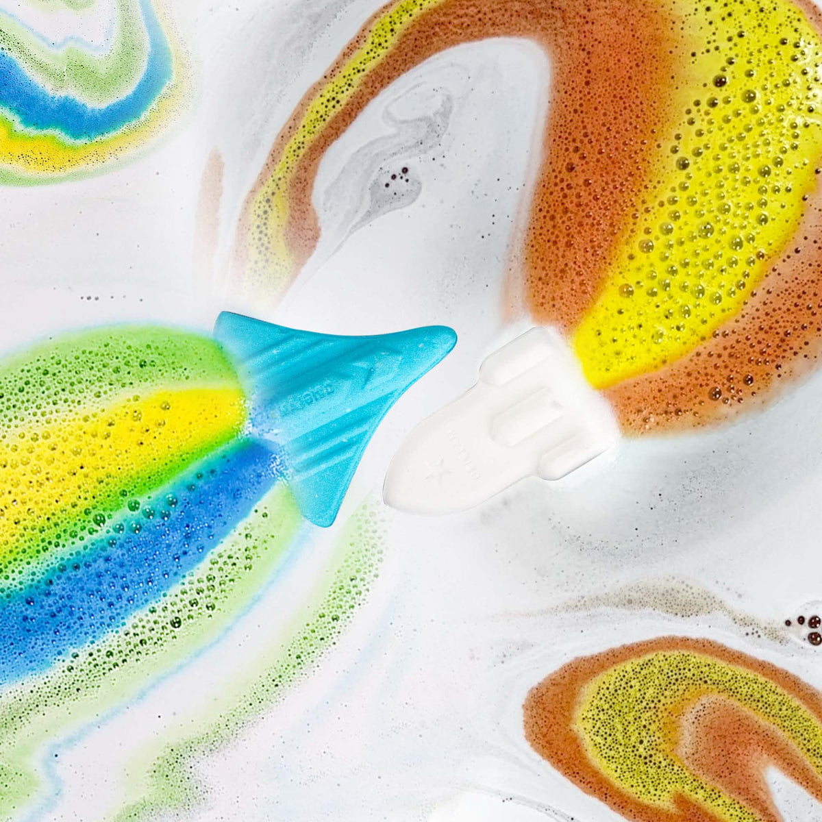 Close-up of ORIGLAM Space Rocket Bath Bomb in water