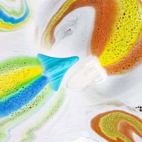 Close-up of ORIGLAM Space Rocket Bath Bomb in water