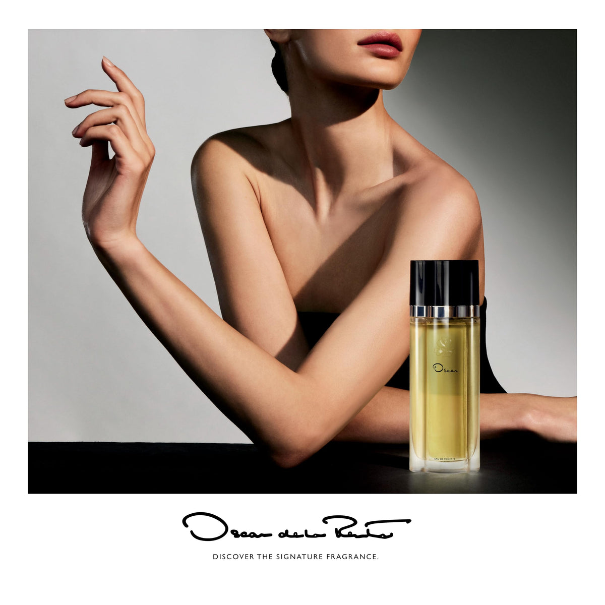 Close-up of Oscar de la Renta perfume bottle