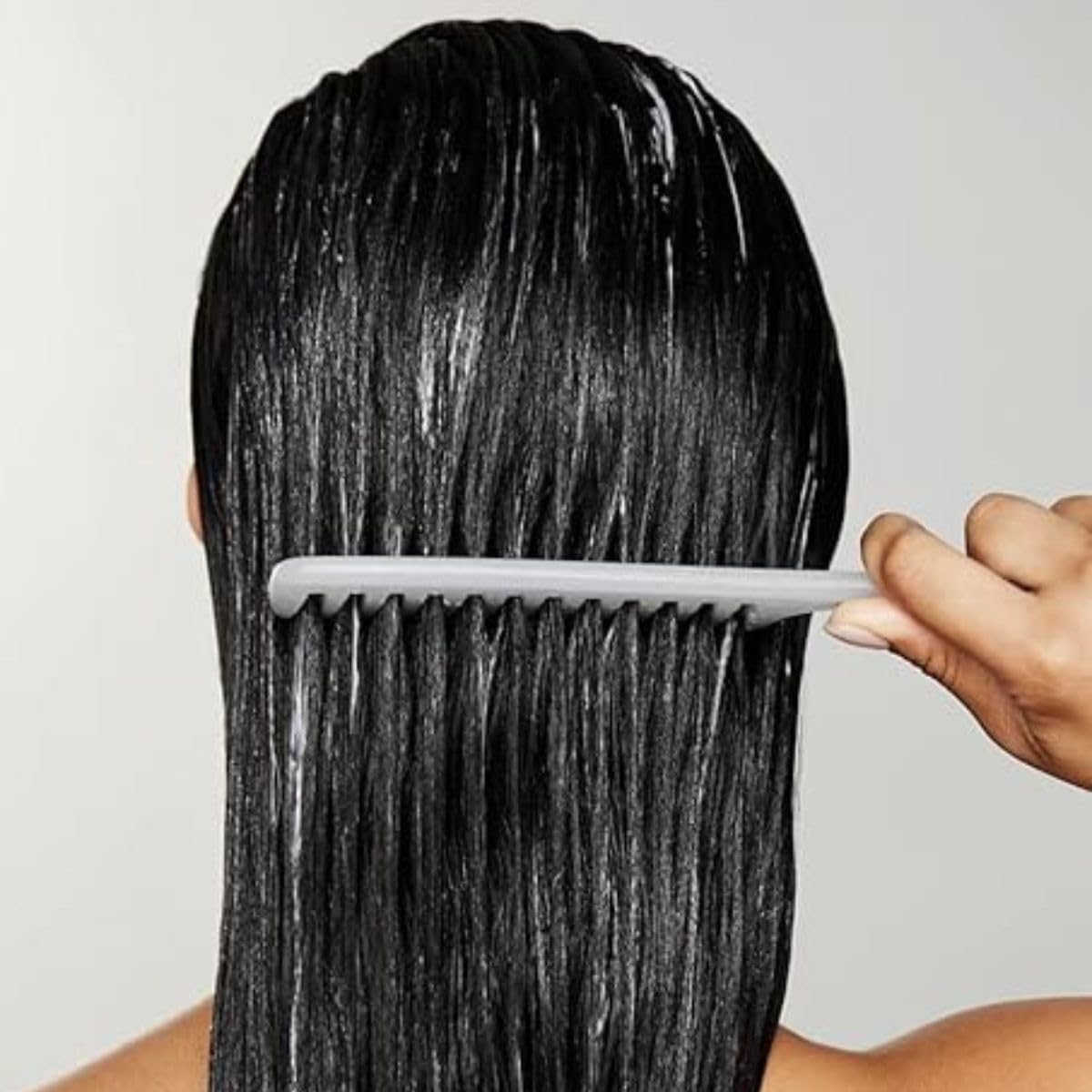 Close-up of Paul Mitchell Detangler Comb showing texture