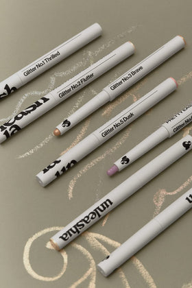 Close-up of Pretty Easy Glitter Stick Nudy Morn tip