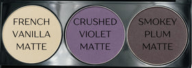Close-up of Pure Ziva eyeshadow palette showing matte deep purple shade