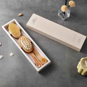 Close-up of ROSENA face cleansing brush included in the set