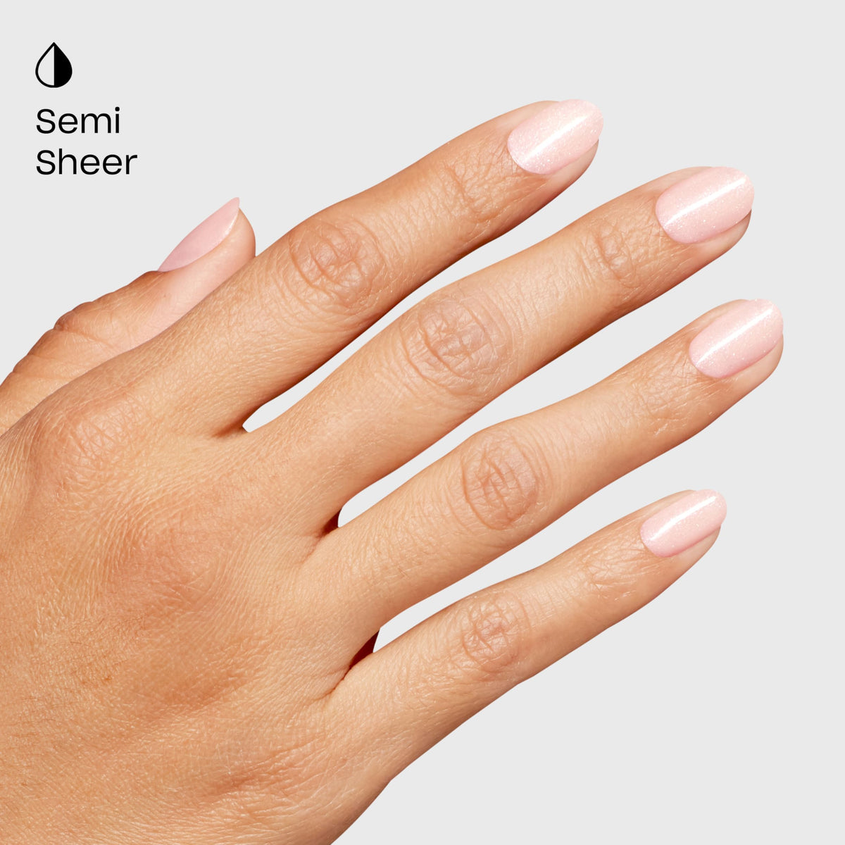 Close-up of rosy-beige shimmer of OPI Hear Me-ow gel polish