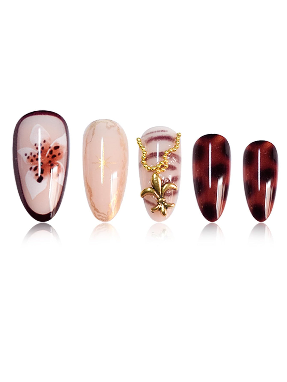 Close-up of SEENEEY press on nails showing gold charm details