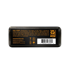Close-up of SheaMoisture African Black Soap showing unique texture