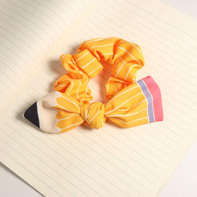 Close-up of SKIRIFLA Pencil Bow Headband detailing
