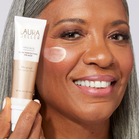 Close-up of Spackle Primer texture on skin