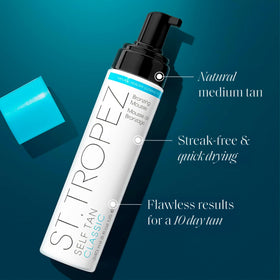 Close-up of St.Tropez tanning mousse bottle