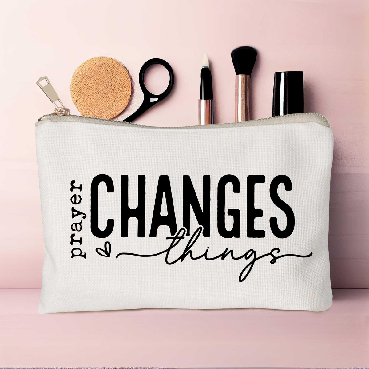 Close-up of the Bible verse printed on HubbgDesign Prayer Changes Things Makeup Bag
