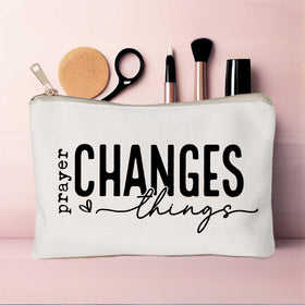 Close-up of the Bible verse printed on HubbgDesign Prayer Changes Things Makeup Bag