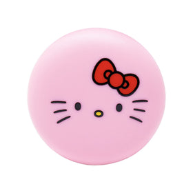Close-up of The Crème Shop Hello Kitty Macaron Lip Balm Watermelon packaging