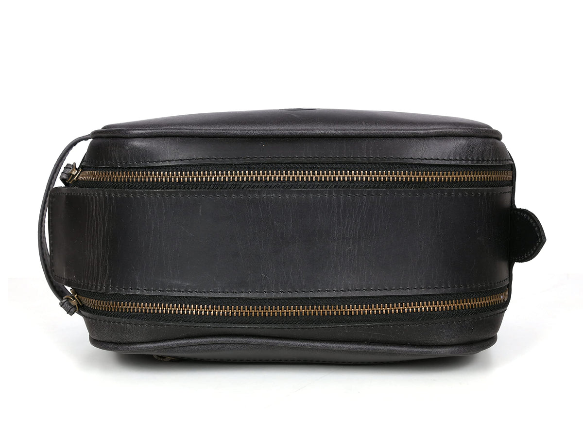 Close-up of the genuine YKK metal zip on AARON LEATHER GOODS toiletry pouch