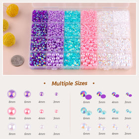 Close-up of TINKRSTUFF flatback pearls in various sizes