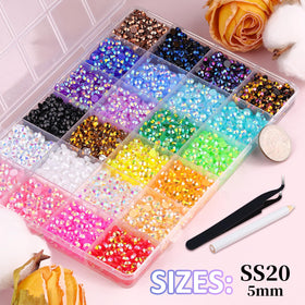 Close-up of TINKRSTUFF mixed-colour rhinestones in box