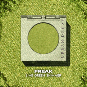 Close-up of URBAN DECAY 24/7 Eyeshadow Lime Green Shimmer texture