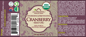 Close-up of US Organic Cranberry Seed Oil bottle showing label