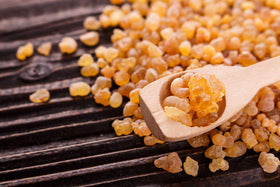 Close-up of US Organic Myrrh essential oil bottle
