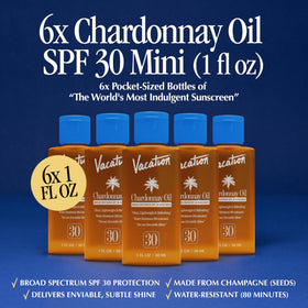 Close-up of VACATION Mini Chardonnay Oil SPF 30 Sunscreen bottle