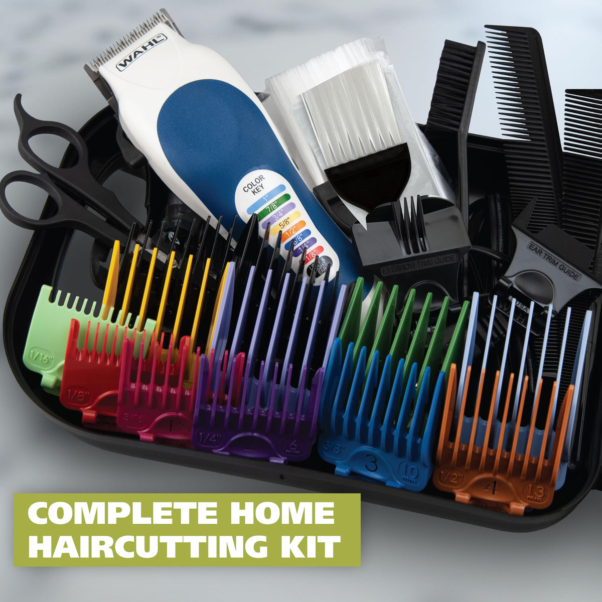 Close-up of Wahl clipper with colour-coded guide combs