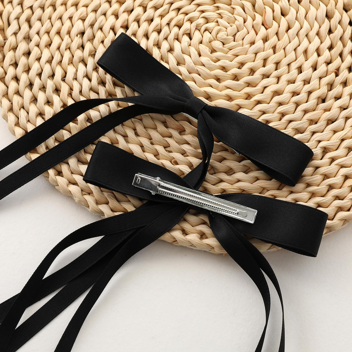 Close-up of WORTL hair bow clip with long tail