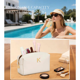 CLOUDWINGS Initial Makeup Bag open with cosmetics inside