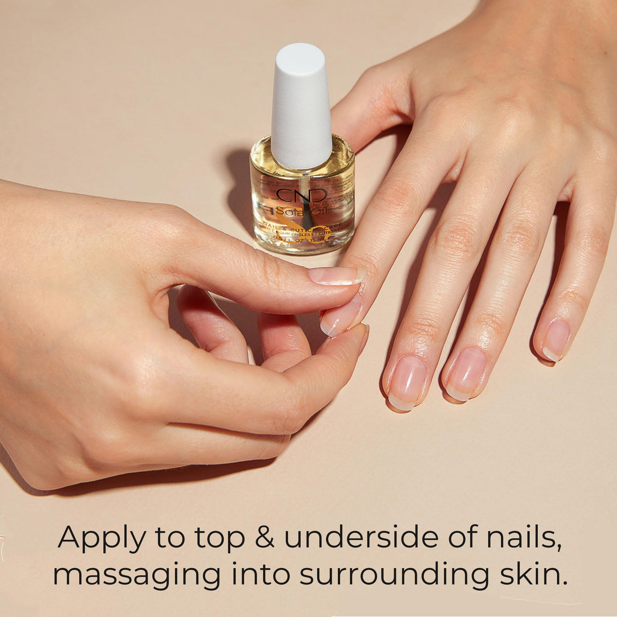 CND SolarOil Cuticle Oil 2.3 oz application on nails
