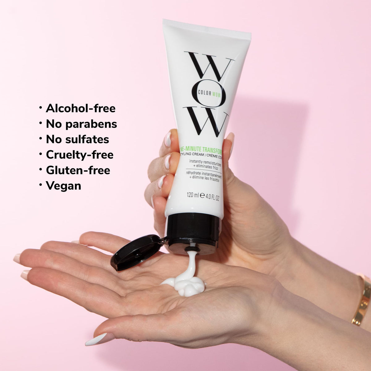 COLOR WOW One Minute Cream on a bathroom counter with styling tools