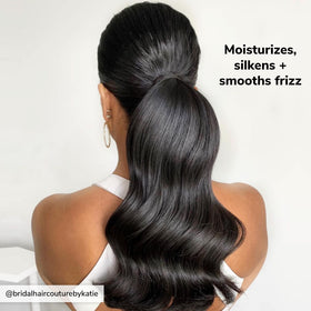 COLOR WOW Pop and Lock Serum on a styled hair background
