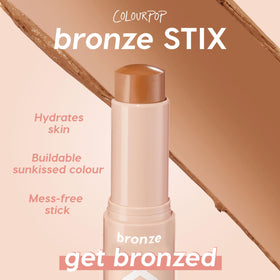 ColourPop Sunny Glow Makeup Kit with sticks on a vanity