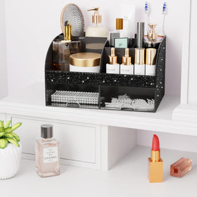 COMFYROOM Bling Makeup Organizer on a dresser with cosmetics inside