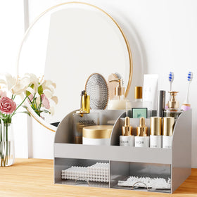 COMFYROOM Makeup Organizer grey model on a vanity with cosmetics inside