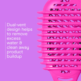 Conair Detangling Brush on a bathroom counter