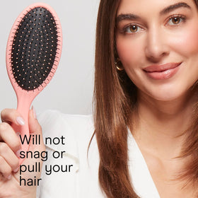 Conair detangling brush with cushioned base and grip