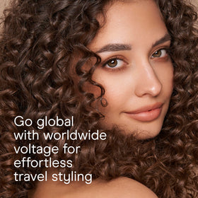 Conair Double Ceramic ½-Inch Curling Iron showing dual voltage feature