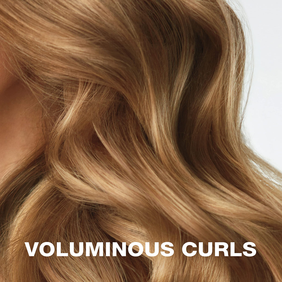 Conair Heatless Curls rollers with hair wrapped around for styling