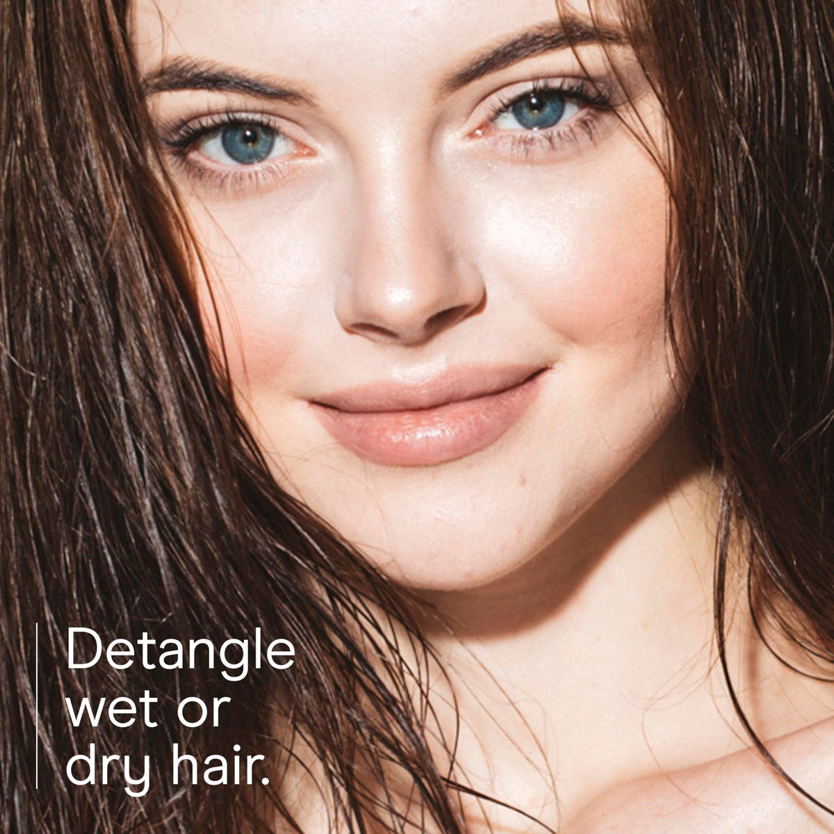 Conair Mini Hair Brush in use on wet hair