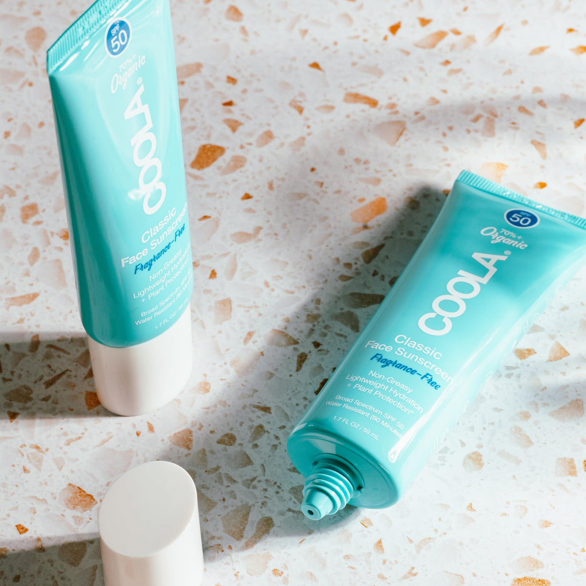 COOLA Organic Face Sunscreen SPF 50 lifestyle scene
