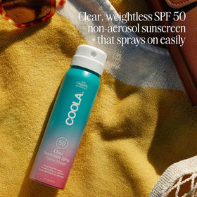 COOLA Organic Sunscreen Spray SPF 50 Guava Mango lifestyle use outdoors