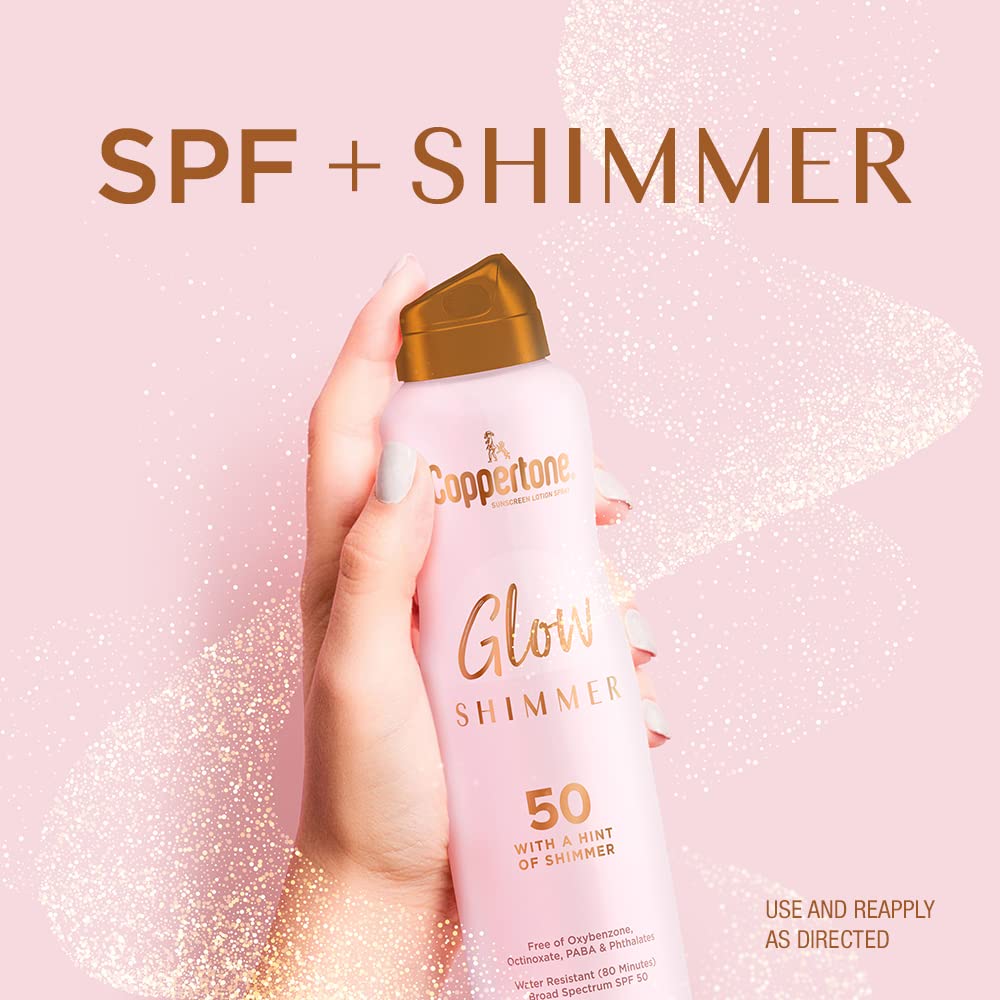 Coppertone Glow Shimmering Sunscreen Spray SPF 50 in use outdoors