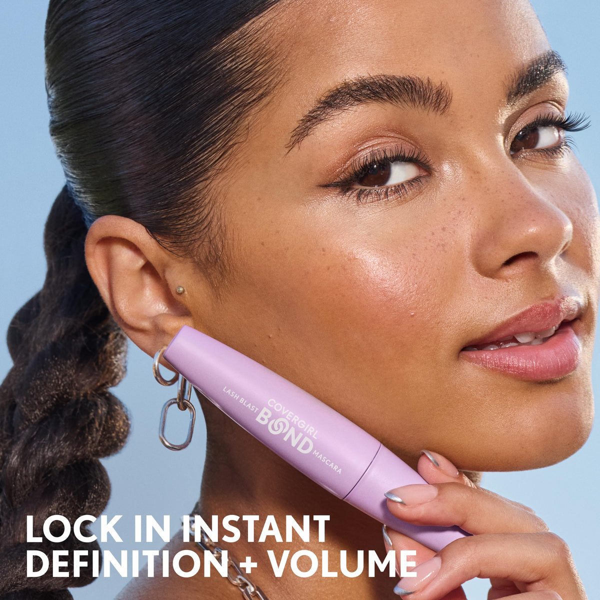COVERGIRL Lash Blast Bond Volume Mascara 815 Brown with makeup accessories