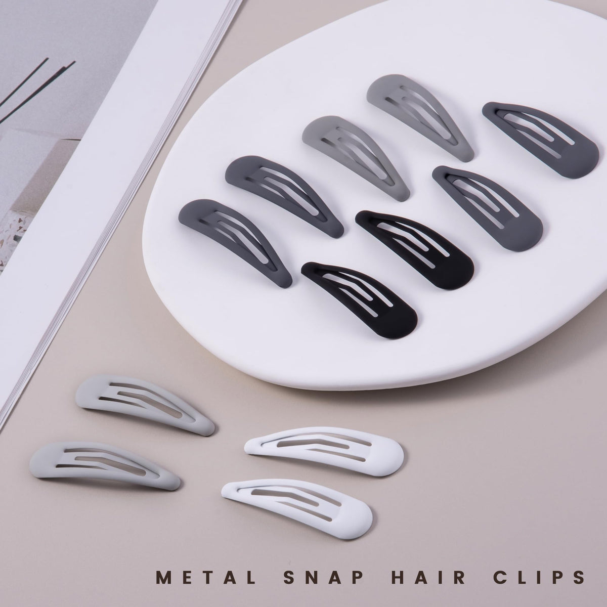 Cptots hair clip in matte gray on a hair bun
