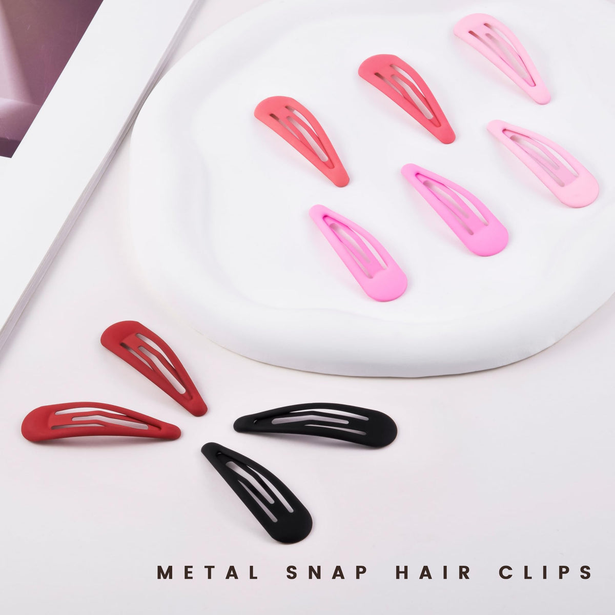 Cptots small hair barrettes in red colour on a white background