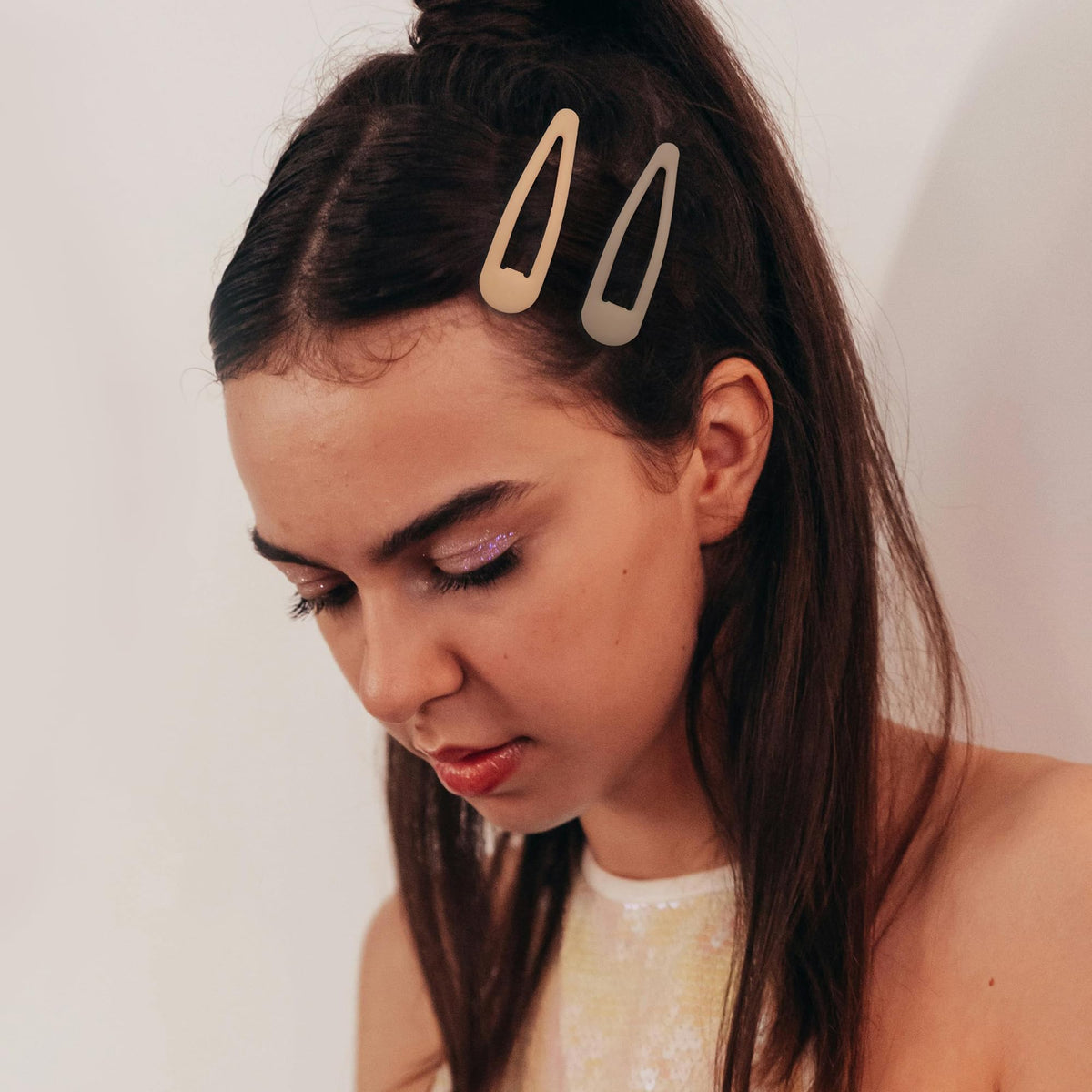 Cptots Small Hair Barrettes on a model's hair